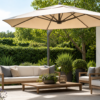 Modern garden patio umbrella shading beige cushioned seating surrounded by lush greenery.