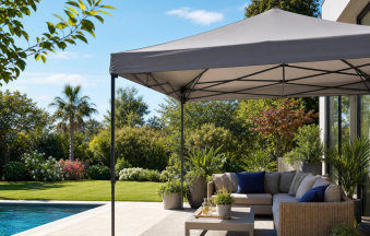Modern patio with a quick shade canopy, lounge seating, and a pool in a lush garden.